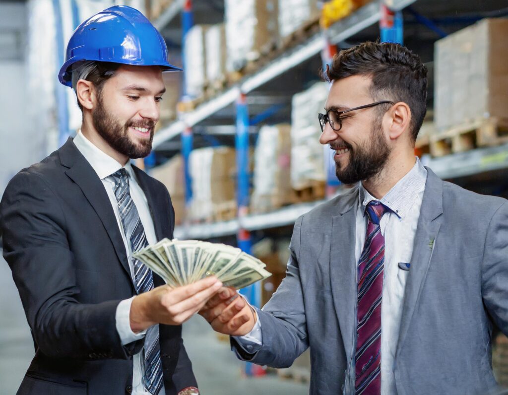 warehouse manager selling pallet racking and receiving dollars